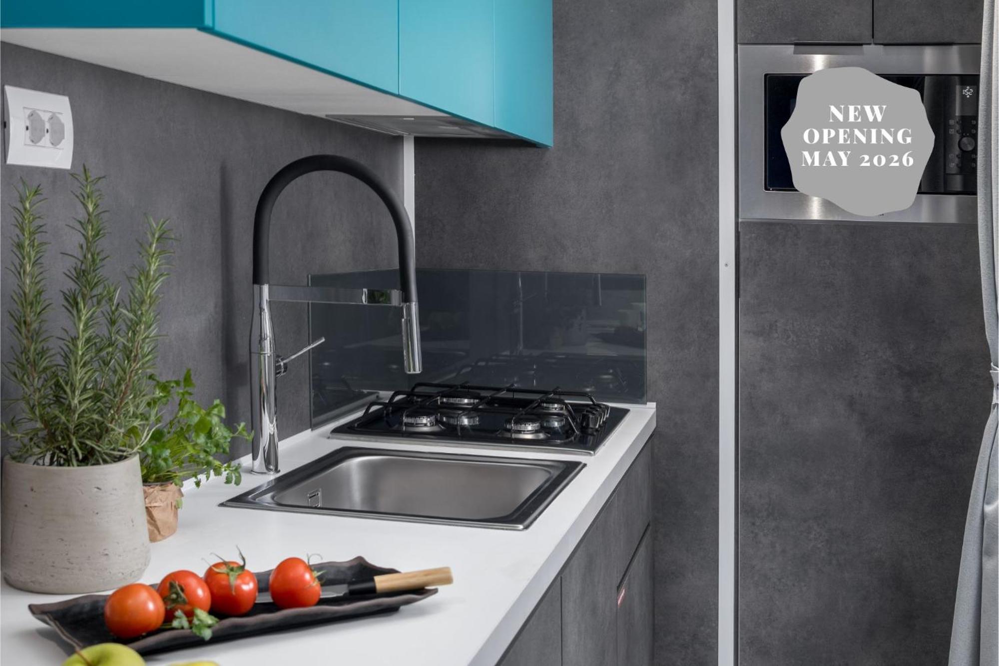 Deluxe Mobilheim mit Garten, 2 Schlafzimmern und Whirlpool